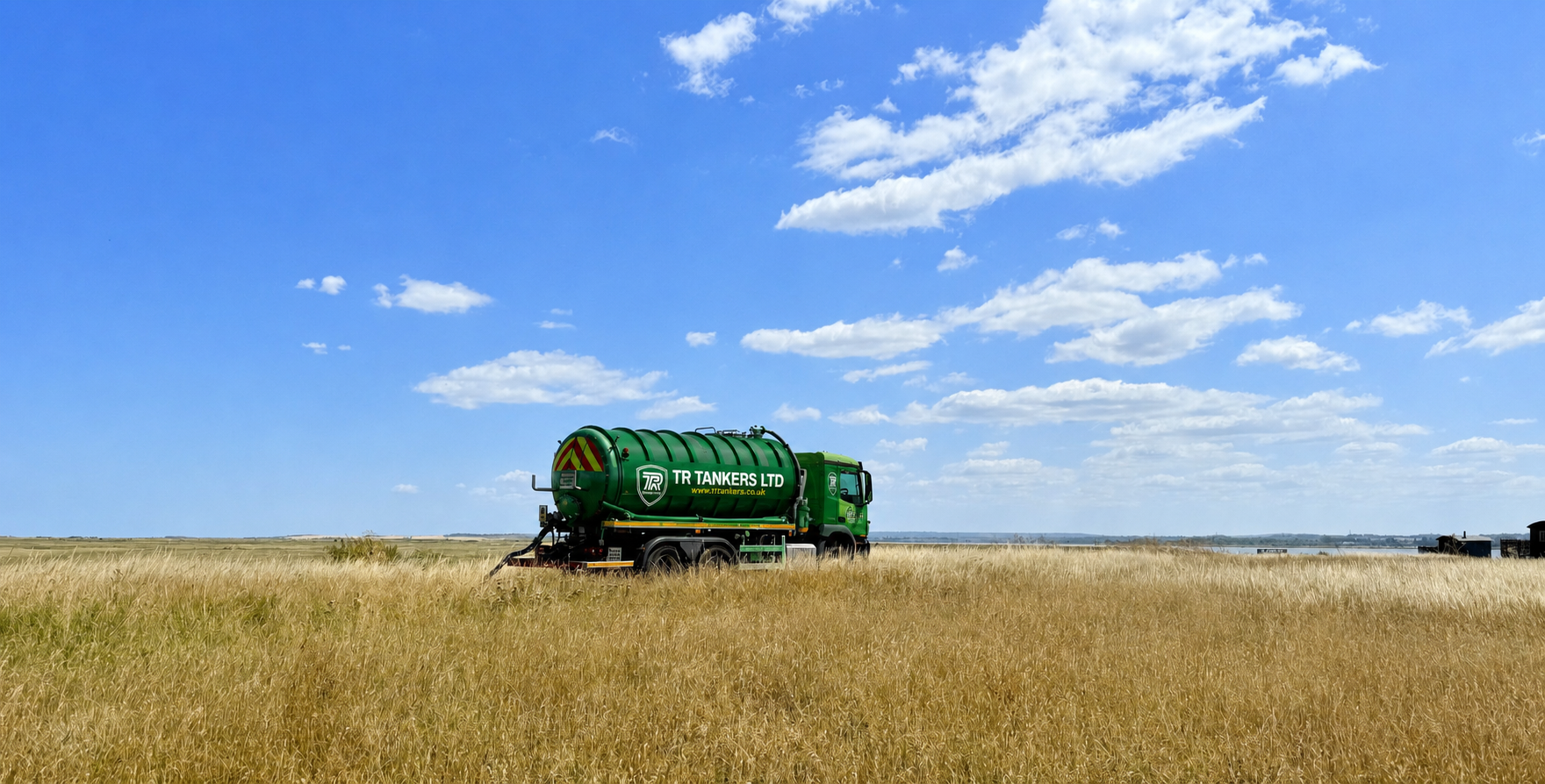 Photo of our waste tanker with a hose coming out into a septic tank